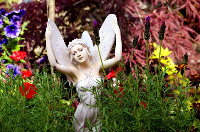 garden tour example - angel statue among flowers